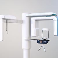 Cone beam scanner in dental office against neutral background