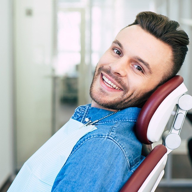 Man with an anchorage device sharing his smile