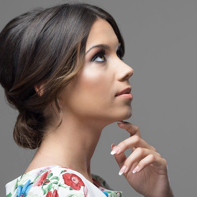 Woman's flawless profile after chin augmentation