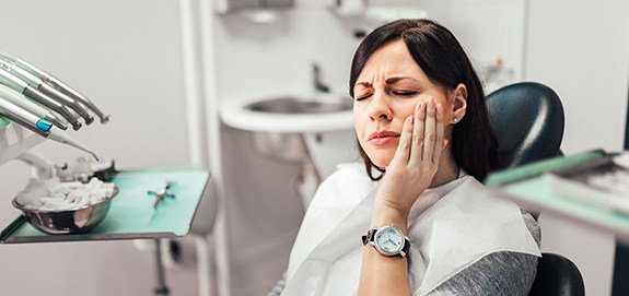 Woman in office for cosmetic facial treatments