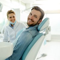 Smiling man visiting his general dentist