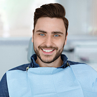 Relaxed oral surgery patient, ready to be sedated with intravenous medications