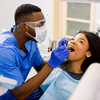 Houston oral surgeon performing oral cancer screening in Houston