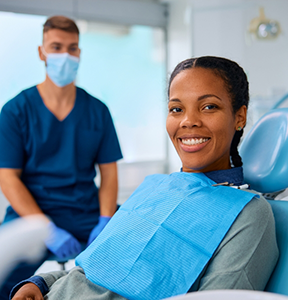 Smiling woman in the dental chair