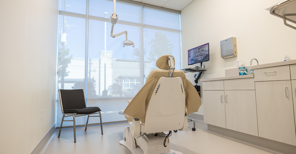 Dental exam chair in oral surgery office in Houston