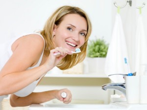 Brush and floss implants as you would natural teeth