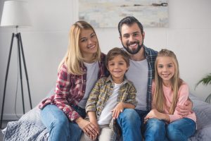 portrait of a smiling family at home