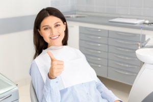 Relaxed patient giving thumbs up for sedation dentistry