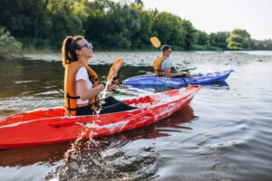 Couple kayaking during summer 