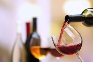 Red wine being poured into glass